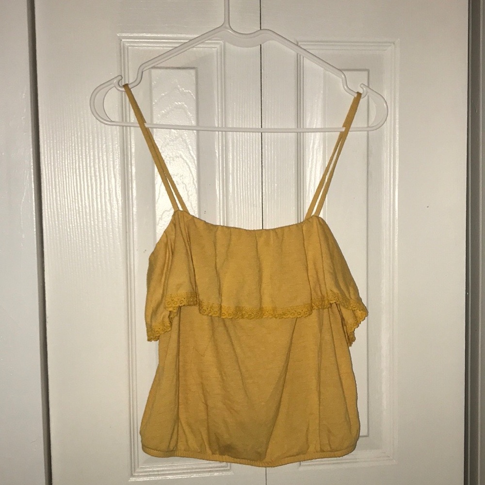 Yellow stretchy crop top with embroidered detail